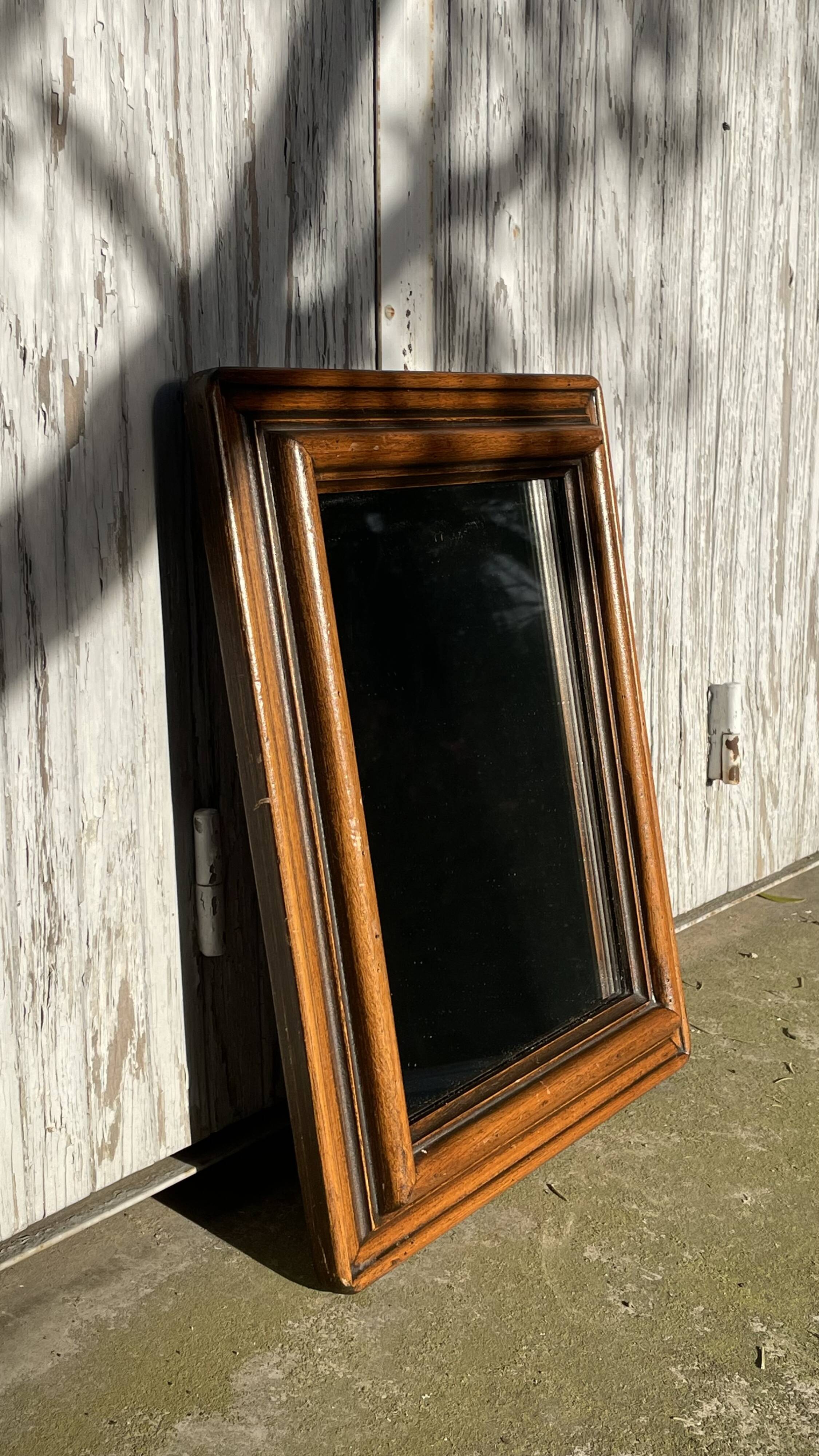 Antique wooden wall mirror