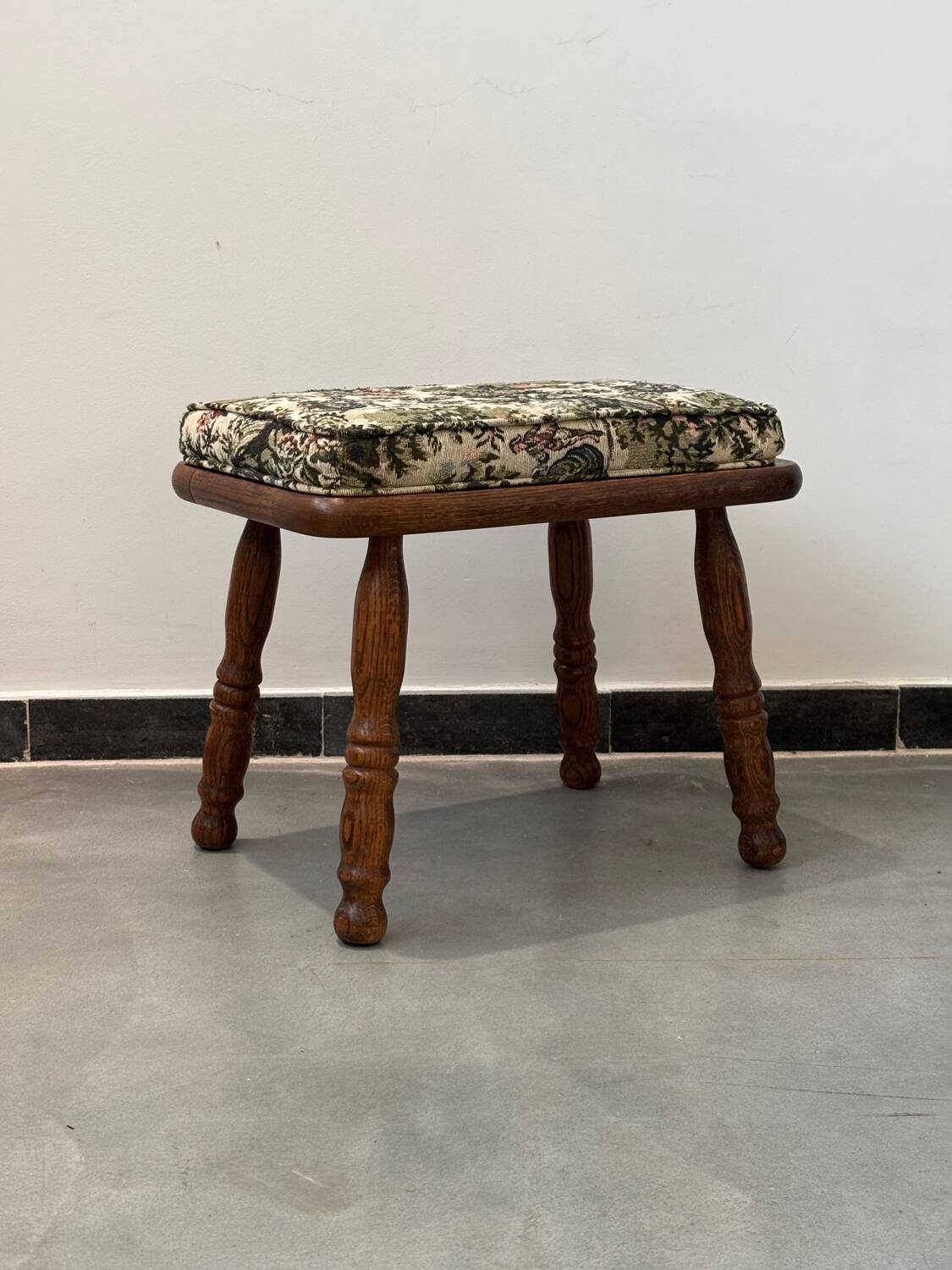 Wooden stool with cushion