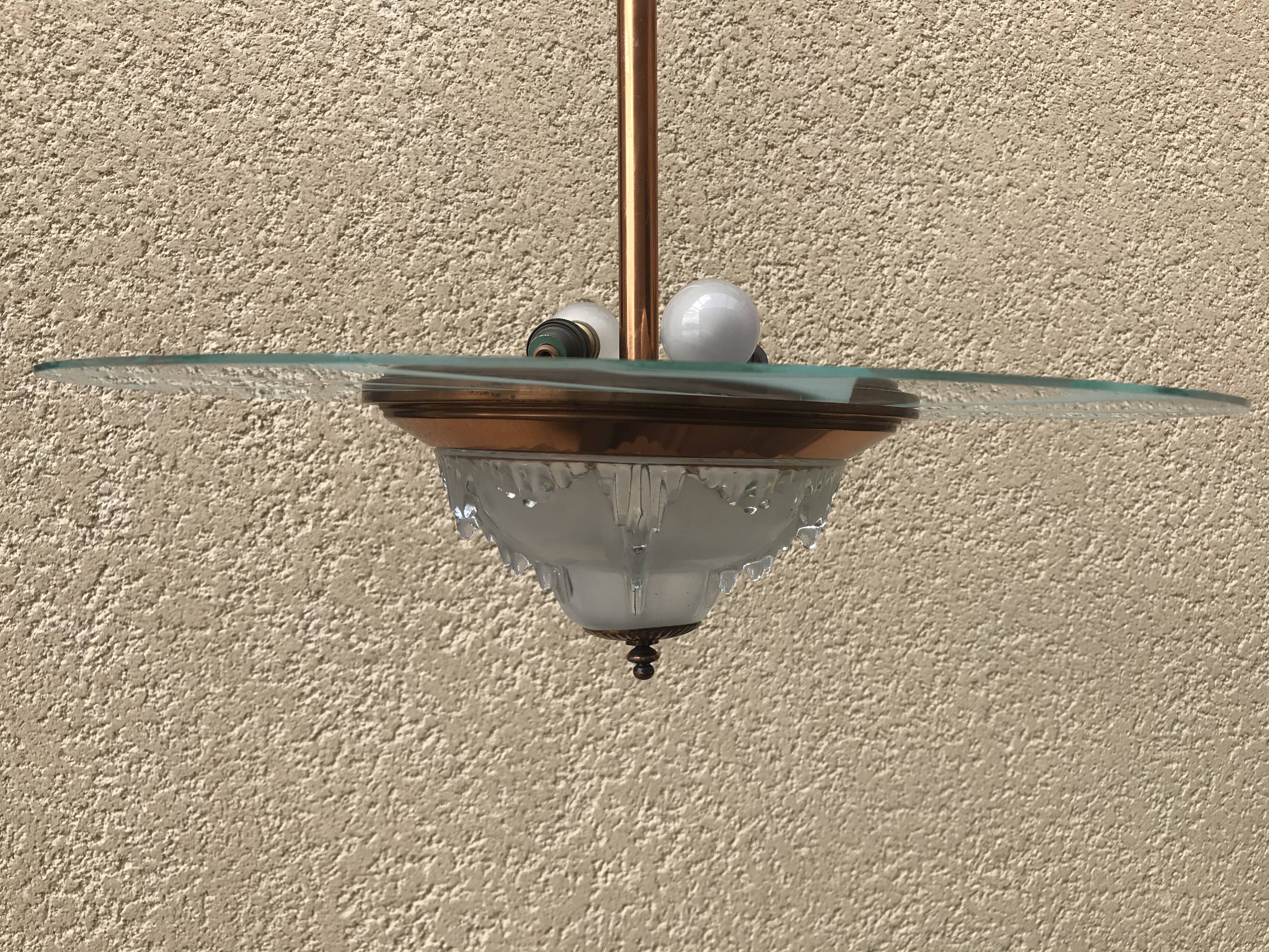 Copper and glass hanging lamp with his Ezan glass disc