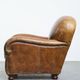 Charming and comfortable vintage armchair in grained cowhide leather with character