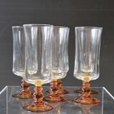 6 amber-footed champagne flutes in very good condition.