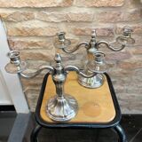 Pair of silver-plated metal candelabra