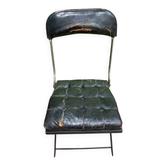 Vintage folding chair in industrial style from around 1960.