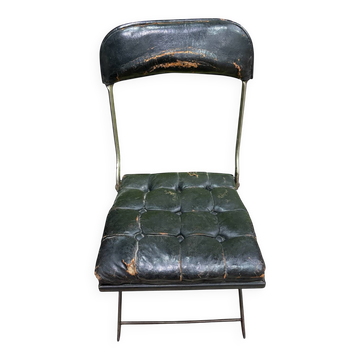 Vintage folding chair in industrial style from around 1960.