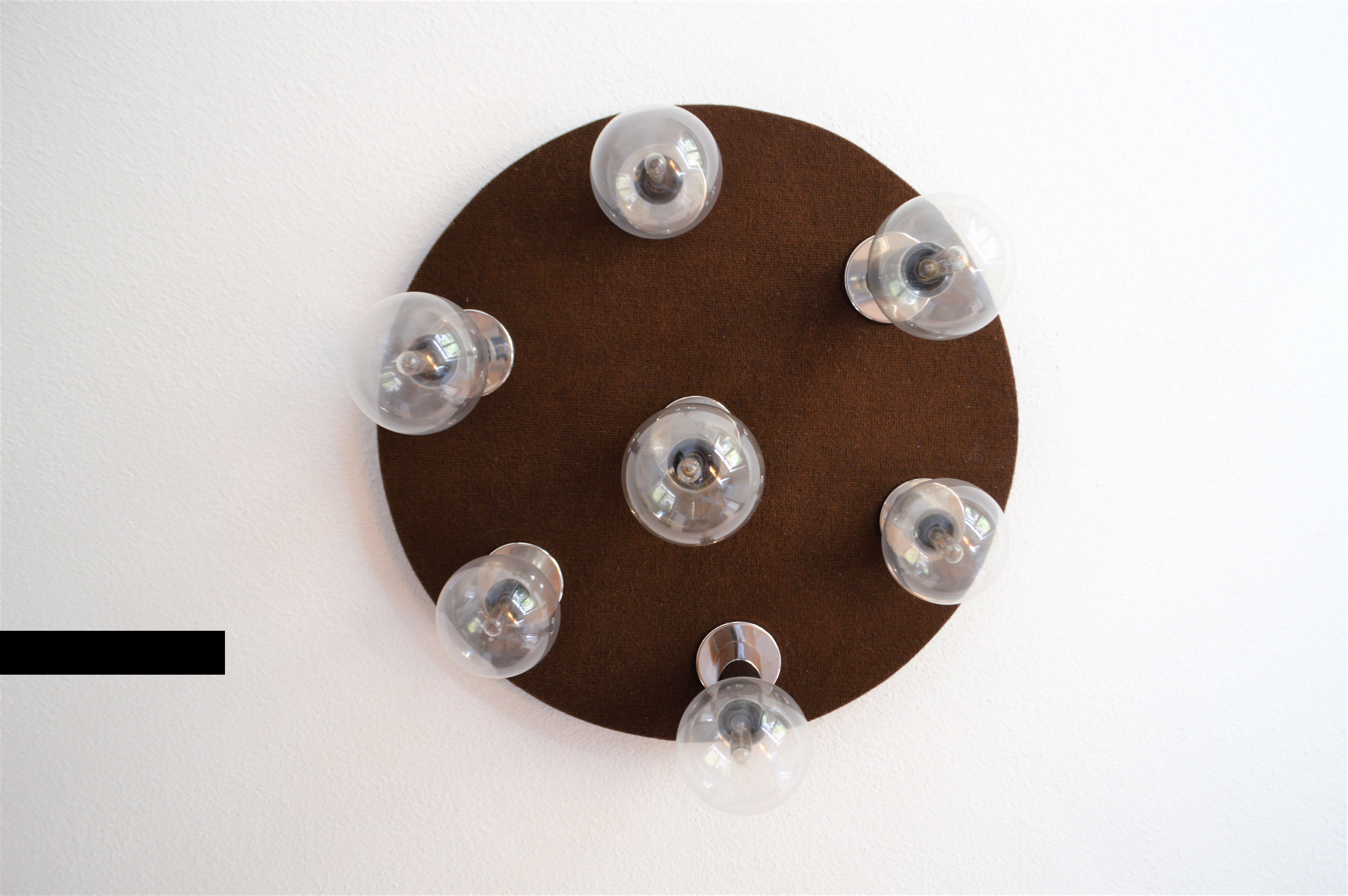 Vintage lamp of the 70s design in chrome glass space age