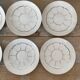White and silver Limoges porcelain coffee cups and saucers.