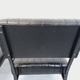 Set of 2 vintage modernist armchairs in black faux leather and metal.