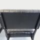 Set of 2 vintage modernist armchairs in black faux leather and metal.