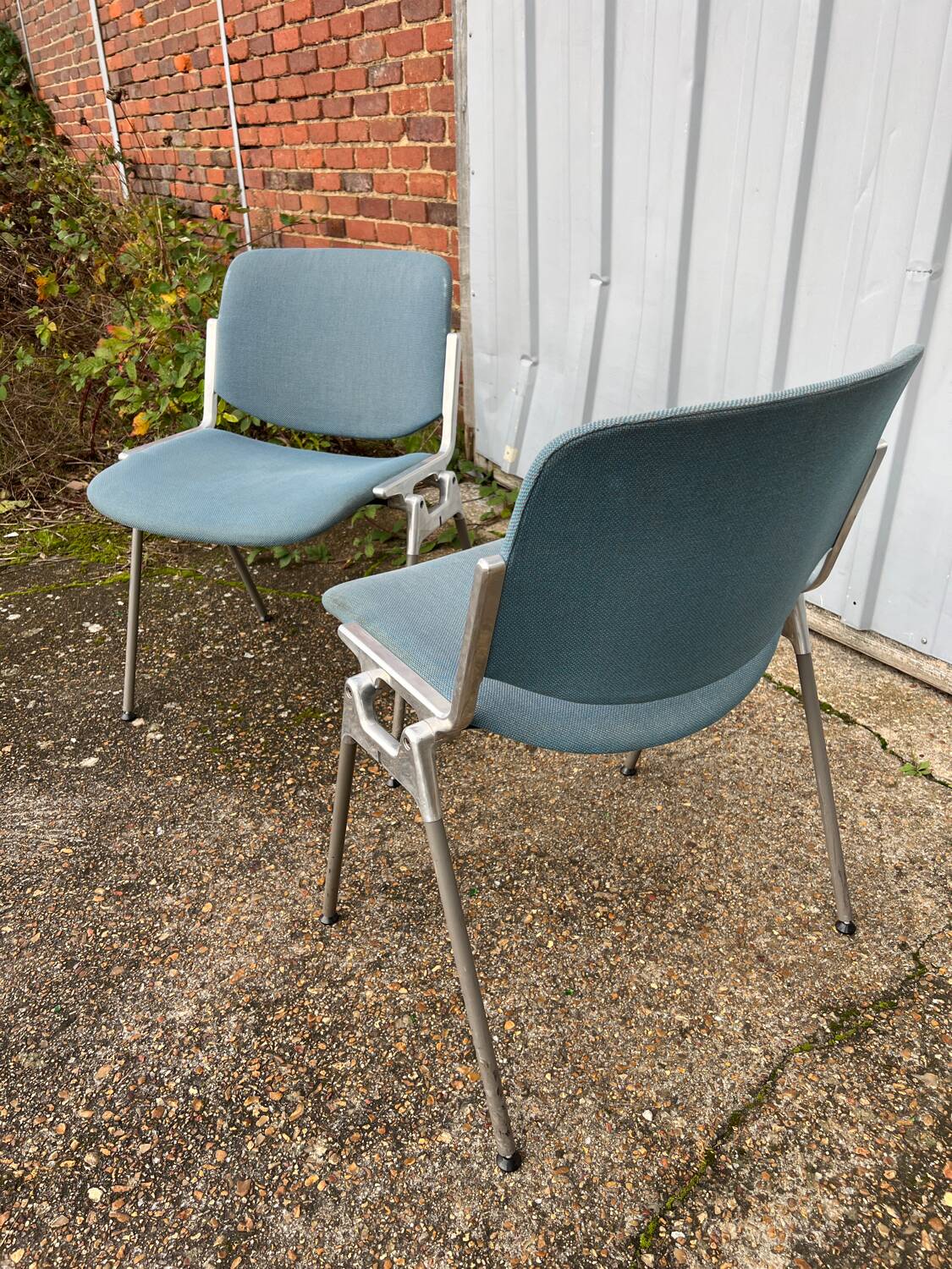 Pair of chairs by G. Piretti for Castelli