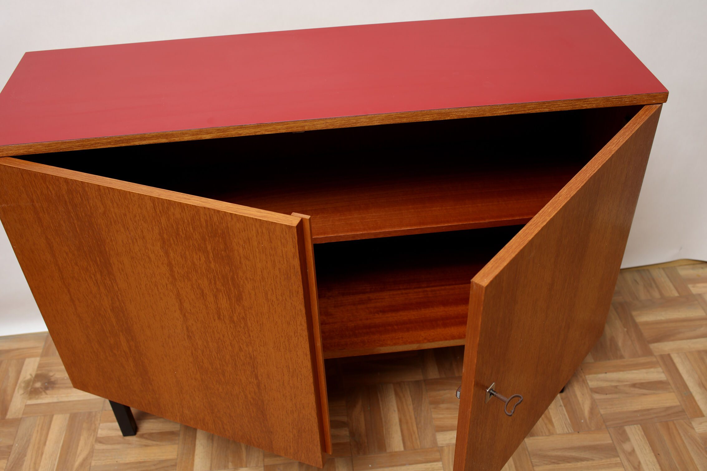 1960s sideboard in teak and formica red