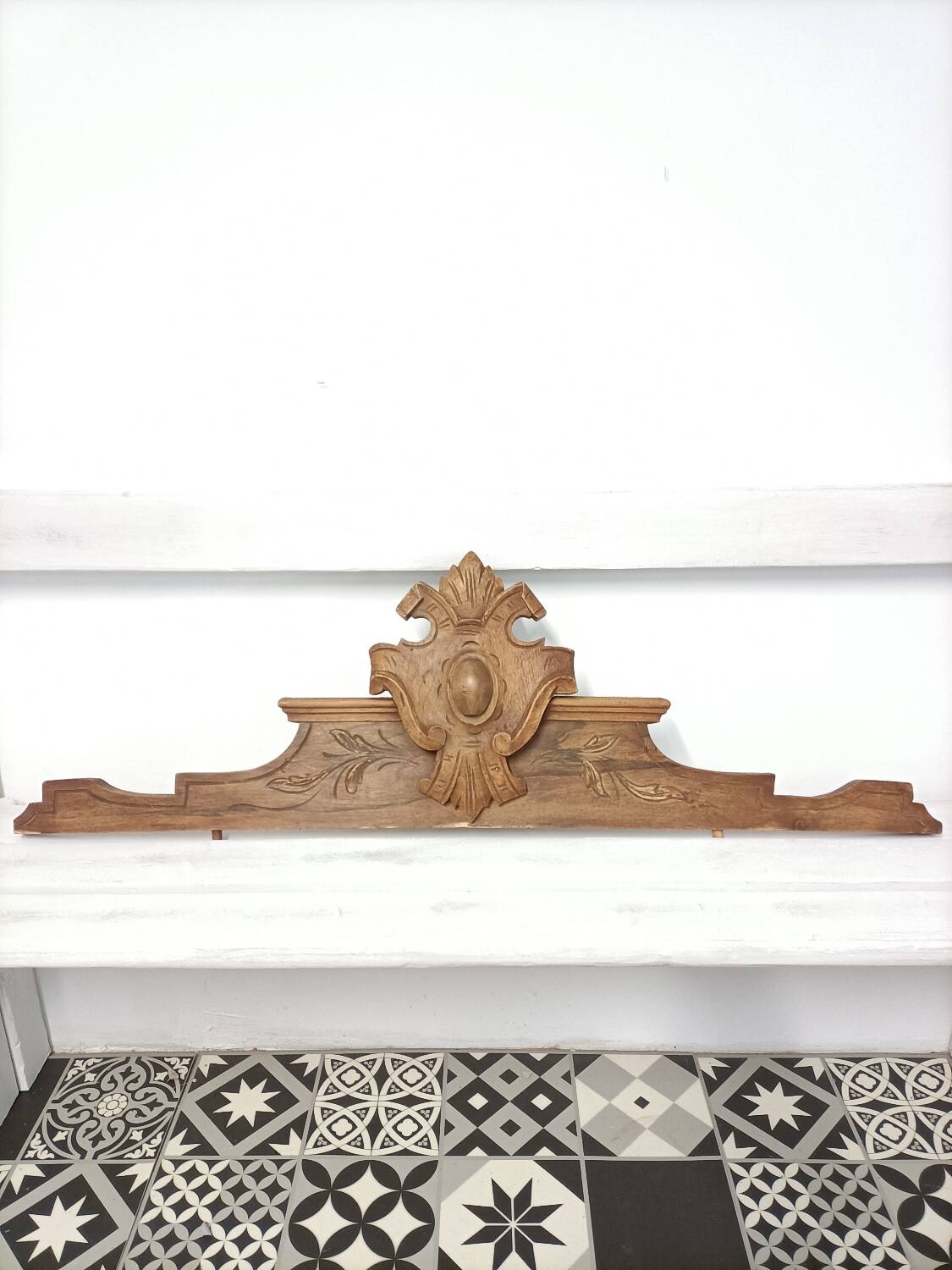 Antique carved wooden door pediment