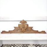 Antique carved wooden door pediment