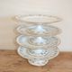 Set of 4 porcelain display cups of the depot rue Drouot in Paris