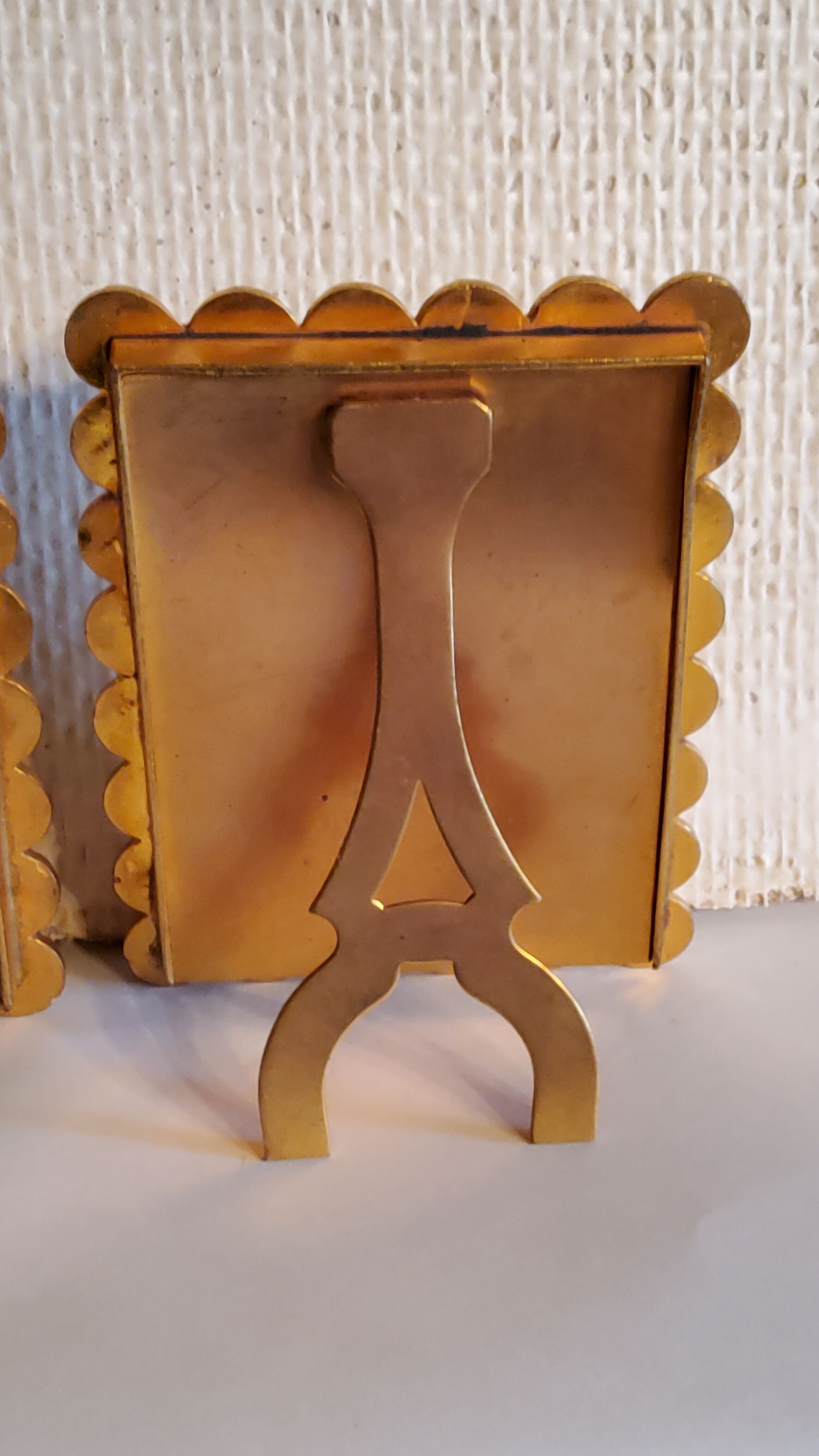 Pair of art deco photo frames in gilded bronze and gilded brass