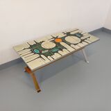 Vintage coffee table from the 60s and 70s in ceramic, chrome metal, and wood.