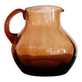 Old amber glass carafe