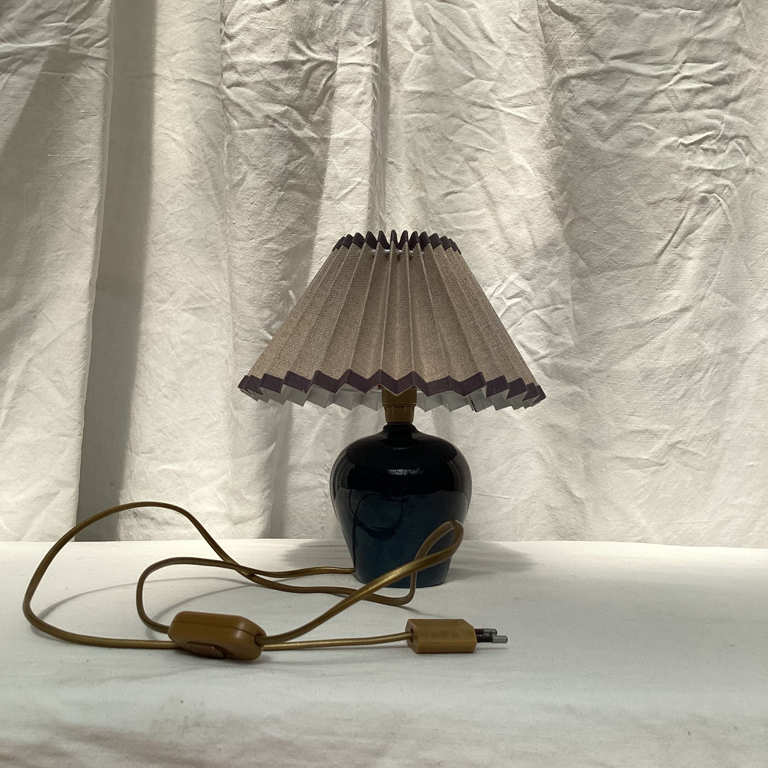 Ceramic lamp signed with pleated lampshade