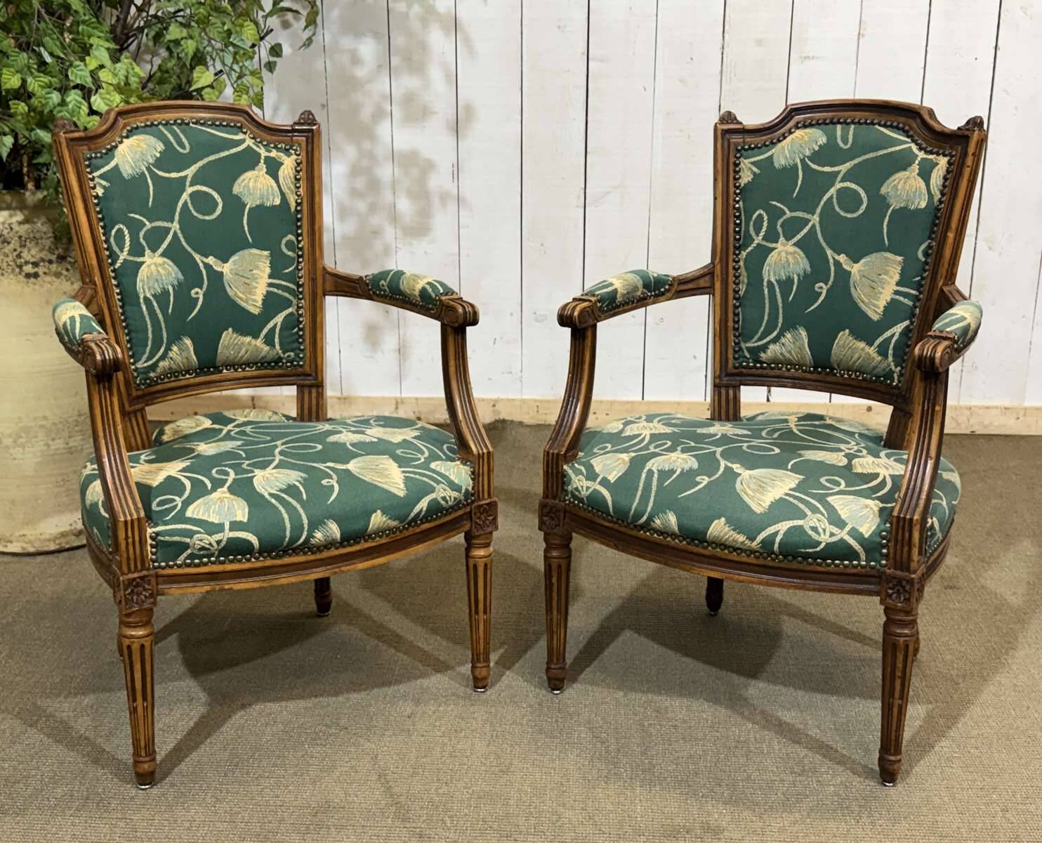 Pair of Louis XVI style armchairs in beech from the 19th century.
