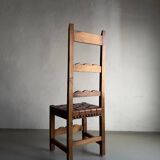2 brutalist carved wood dining chairs with leather seat | The Netherlands | 1970s
