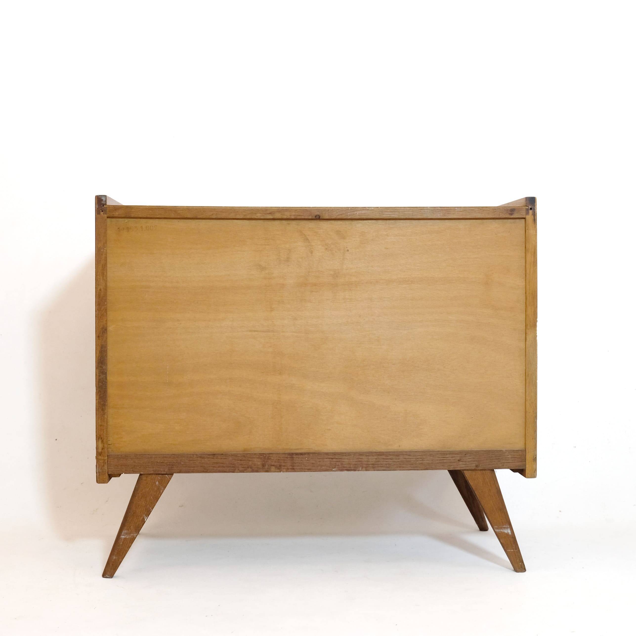 Wooden and rattan chest of drawers from the 60s.