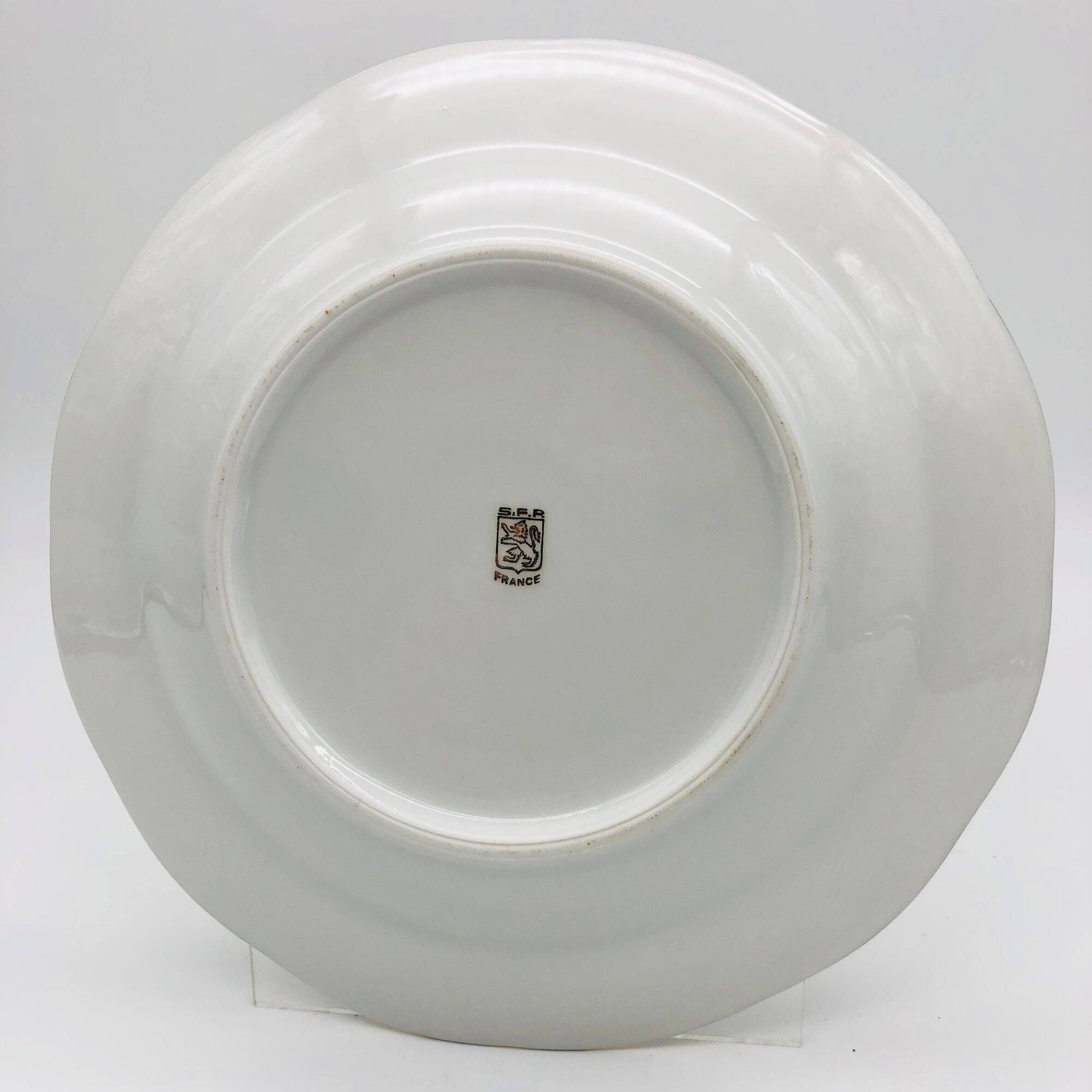 6 deep plates. In S.F.P. Limoges porcelain.