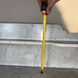 Antique wood and marble kitchen sideboard with carved backsplash