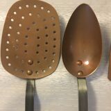 batch of copper utensils