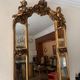 Golden Rococo-style mirror with chest