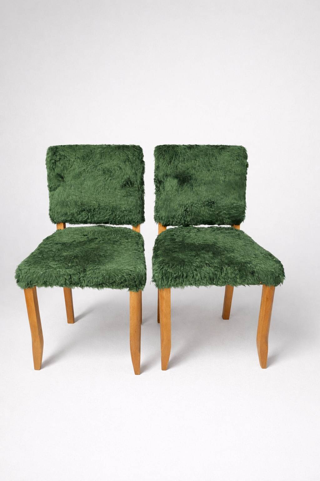 Pair of vintage wooden chairs with green fur effect upholstery – Year