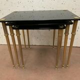 Pull out tables in brass and black glass XX century