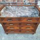 Art Deco commode with marble top, vintage antique furniture.