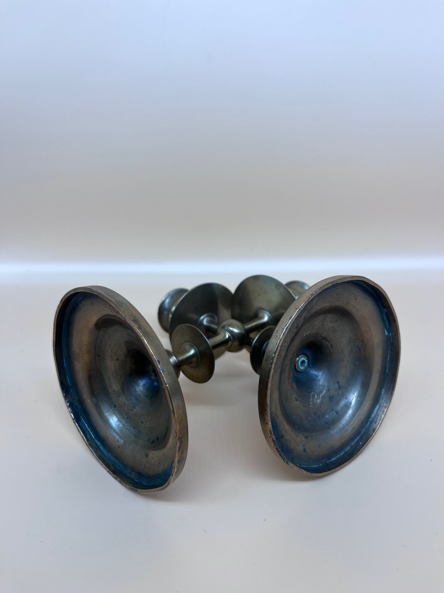 Pair of brass candle holders