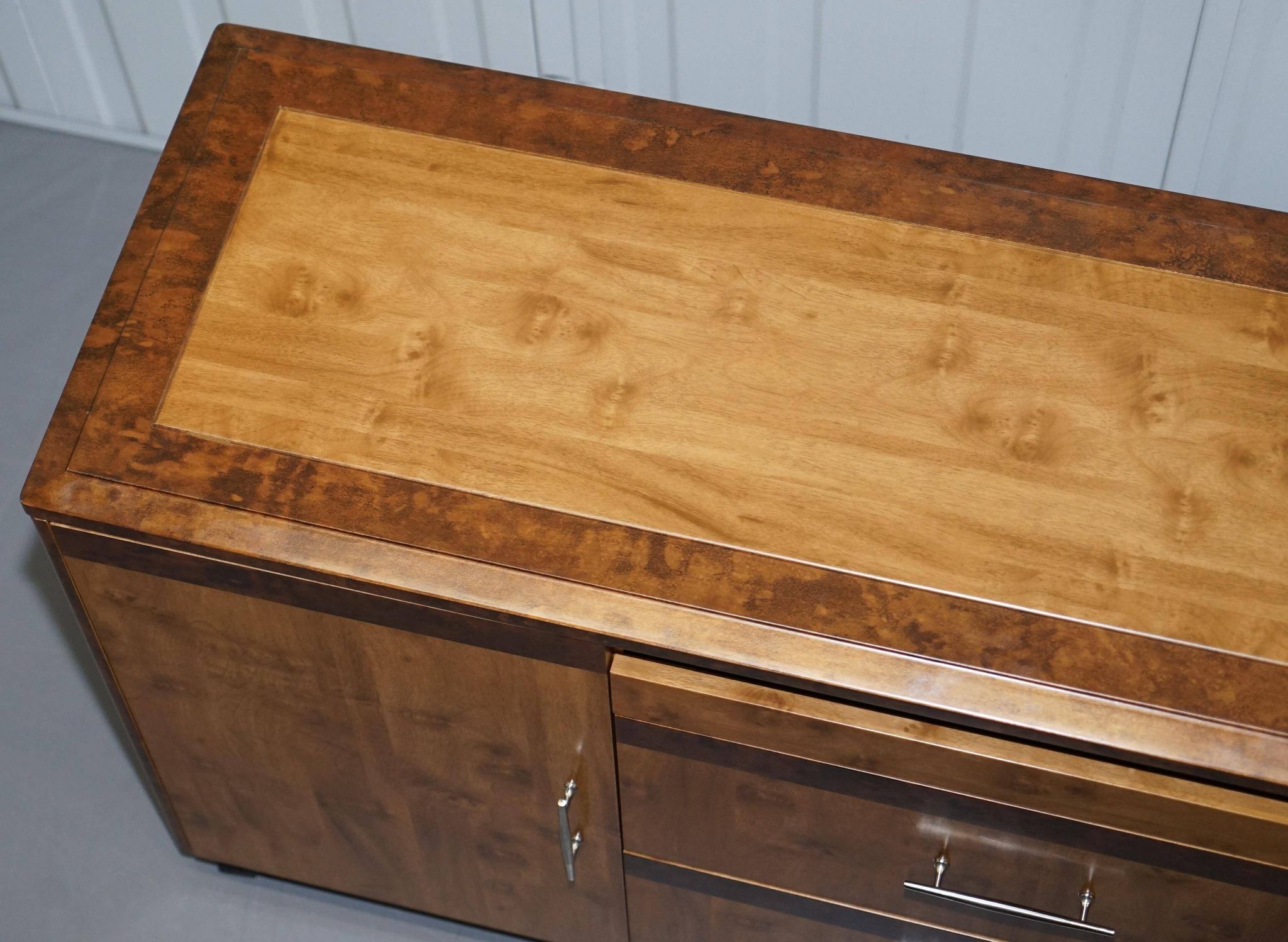 Walnut Burr buffet with drawers and wheels, part of a set.