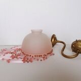 Pink glass wall lamp with garland of pearls