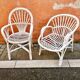 Deux fauteuils en rotin blanc