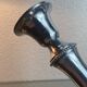 Pair of silver-plated metal candlesticks