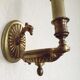 Traditional Empire wall light with eagle head in antique brass 5219