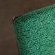 Boomerang chair in green fabric