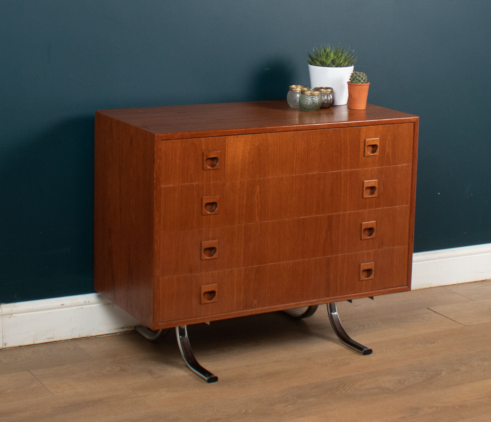 Retro teak 1960s danish chest of drawers on metal legs