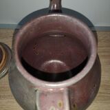 Lidded sandstone carafe