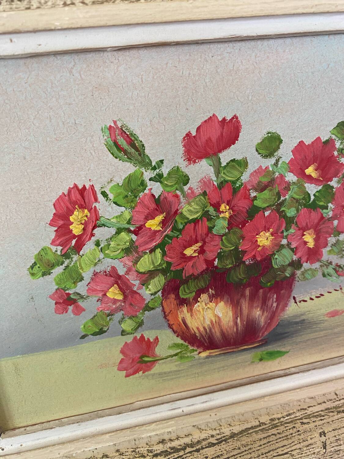 Oil painting red country flowers in a vase.