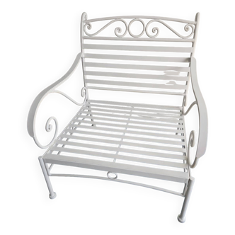 Robust wrought iron armchair