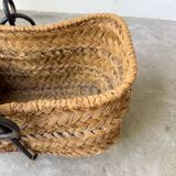 Magazine rack or log rack in straw with brutalist base from the 50s