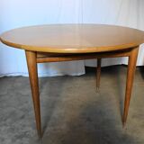 Round table with 2 extensions in light oak from the 1950s