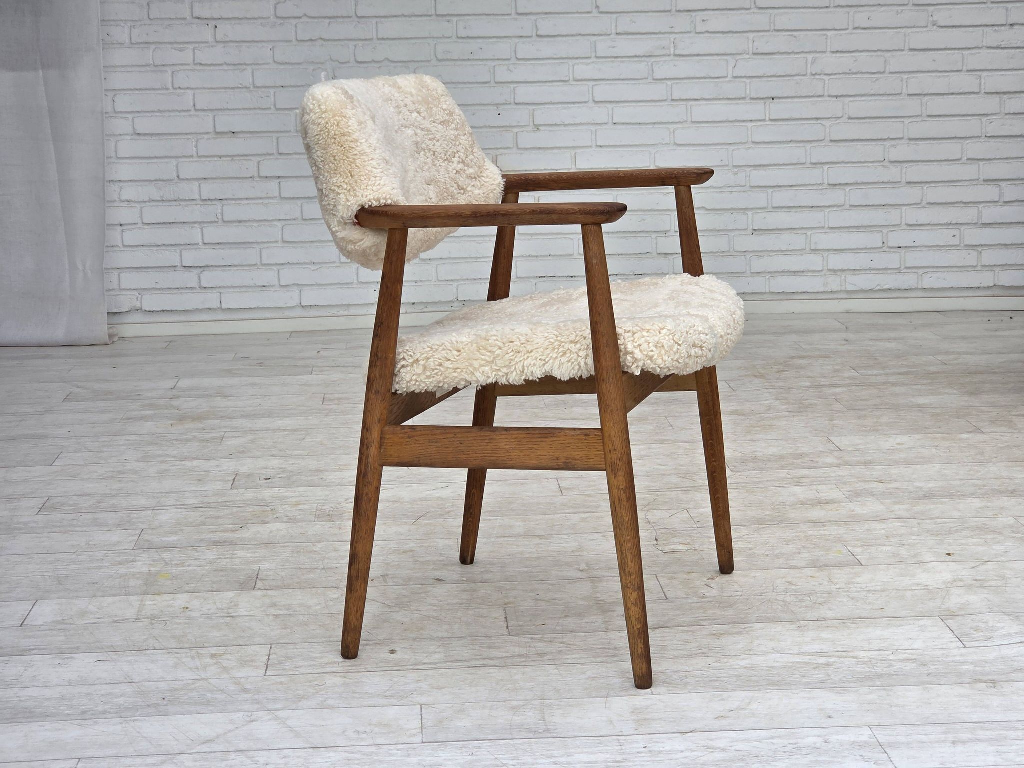 1960s, Danish design by Erik Kirkegaard, model 43, genuine sheepskin.