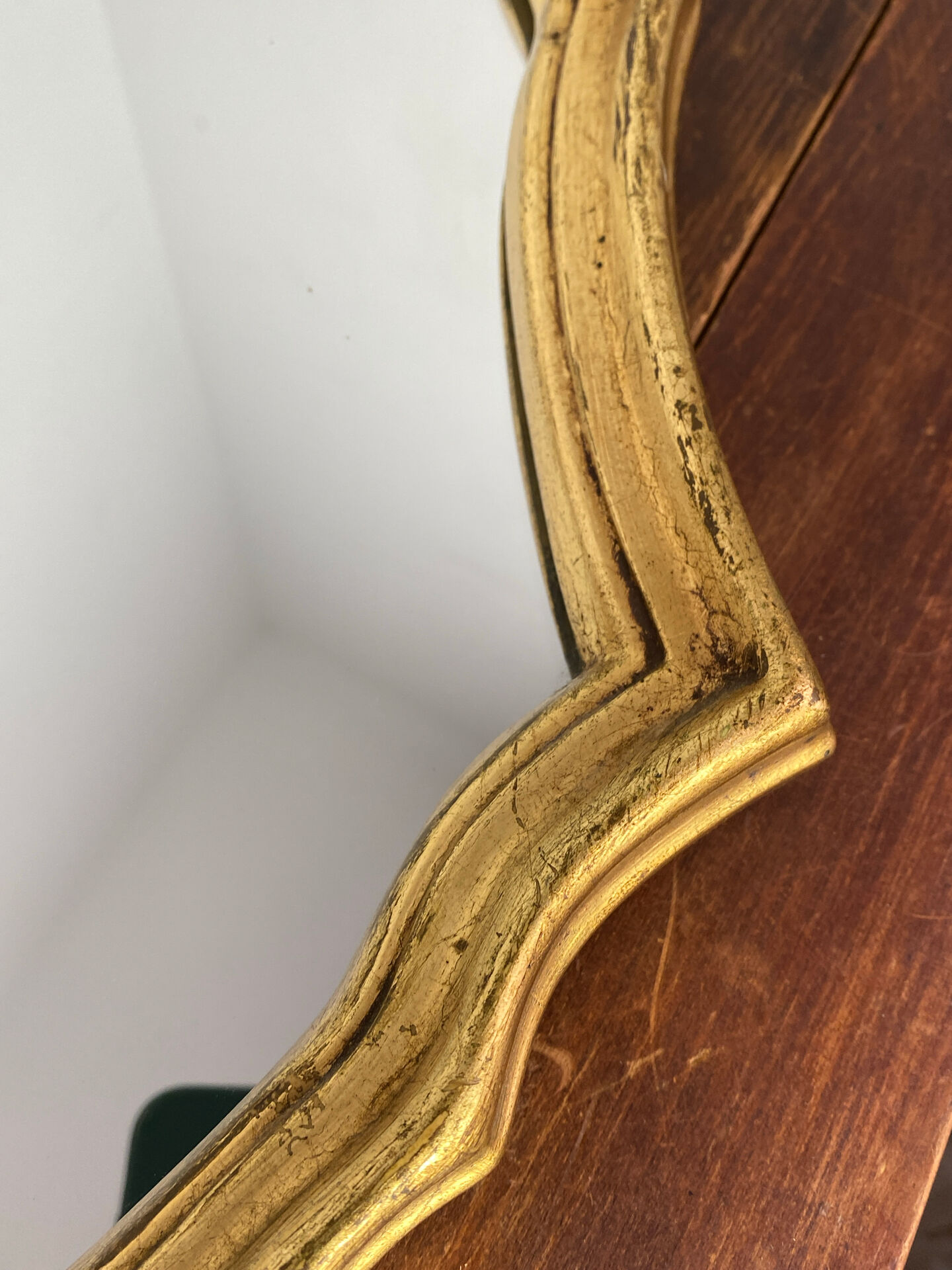 Large baroque mirror in gilded wood