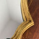 Large baroque mirror in gilded wood
