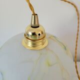 Marbled opaline suspension