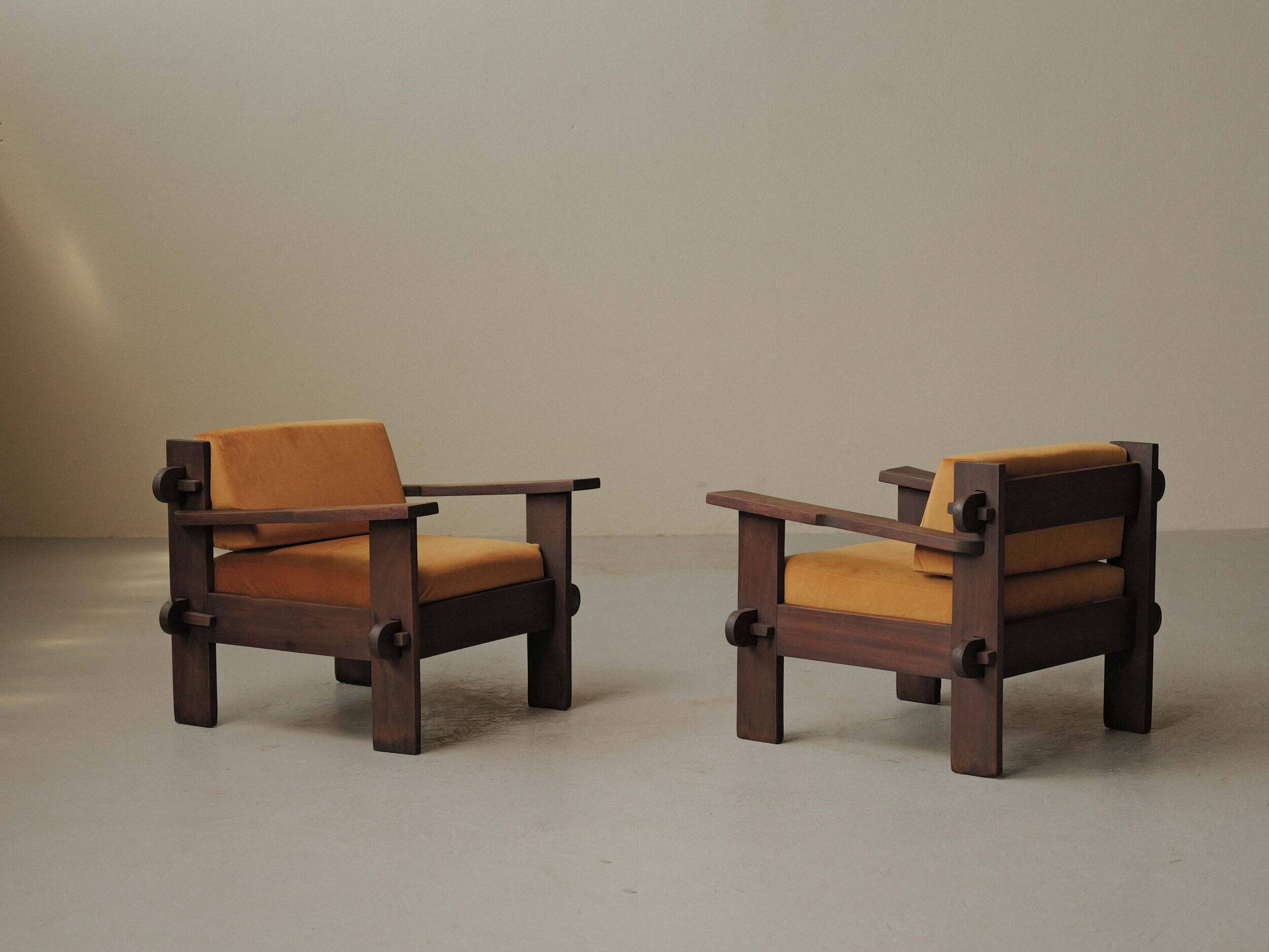 Pair of architect's armchairs in solid wood, France, circa 1970.