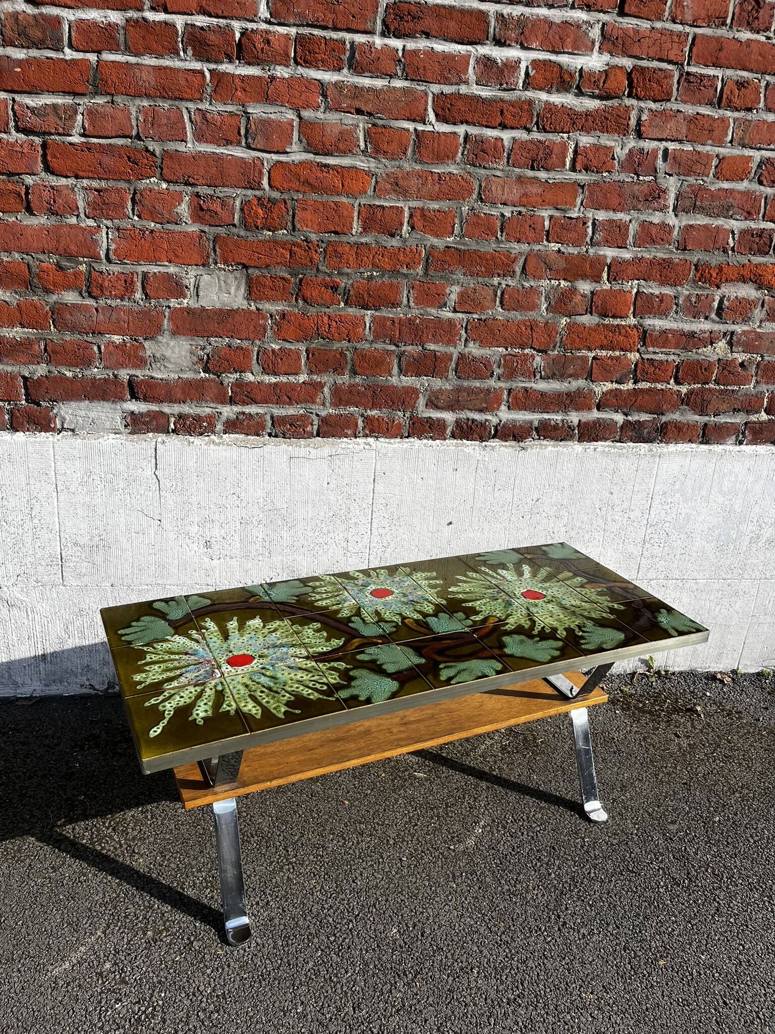 Vintage ceramic coffee table, floral patterns and chrome base.